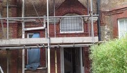 Removal of paint uncovered a multitude of sins. Doff machine in foreground.