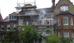 Paint and render removal work underway
