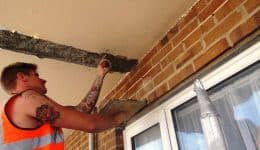 concrete-repair-mortar-being-applied