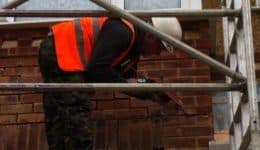 masonry-beams-being-injected-with-grout