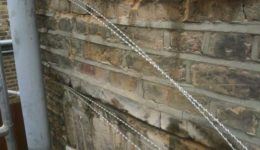 Installing Masonry Beams for Crack Repair