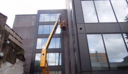 using-cherry-picker-to-repair-damaged-brick