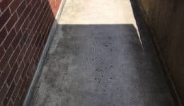 external balcony walkway prior to application of rapid cure waterproof and anti-slip coating