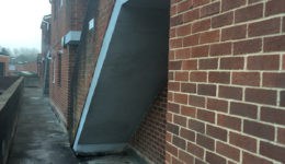 External walkway prior to coating with Polyac Rapid, rapid cure, anti-slip, waterproof coating.