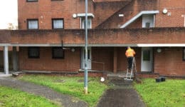 Fairing coat applied to repaired concrete surfaces