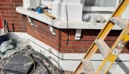 Repairing cracks around window bay