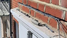 Repairing cracking in bay window with helical bar